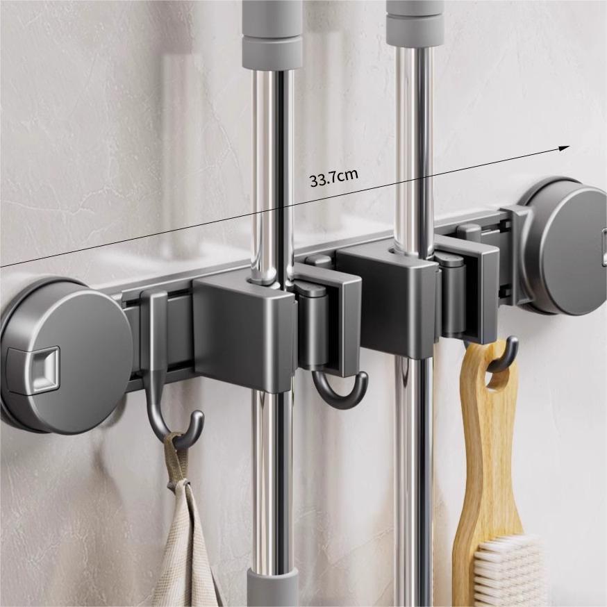 

Самоклеящийся держатель для швабры и веника на присосках для хранения на стене или двери