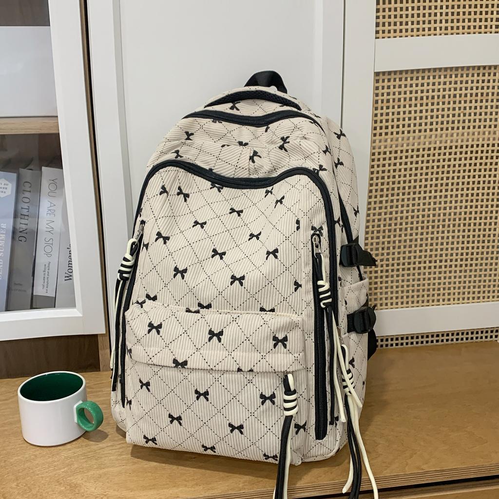 Bow Print Corduroy Backpack Casual Fashion Daily Bag Large Capacity School Bag for Students Minimalist Design Commute Travel with Tassel Accents
