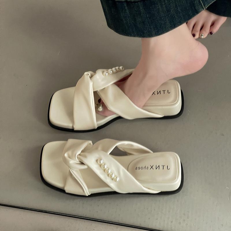 Retro pearl bow flat bottom cool slippers women's summer French fashion Xingkang outer wear with skirt one-word slippers