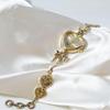 Orologio Bracciale a Cuore con Fiocco Oro Retrò per Donna