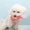 A Simulation Toy of A Dog Chewing Steak with A Tomahawk