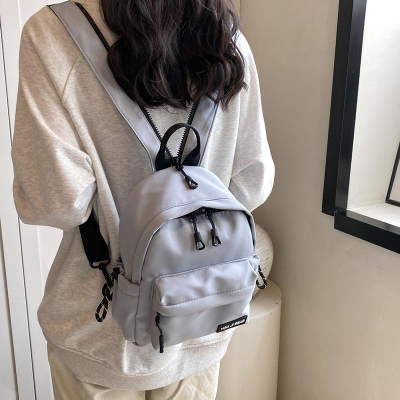 Schoolbag simple and versatile small backpack female niche design ins style schoolbag Korean version single shoulder crossbody student multi-purpose 