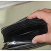 Used SAINT LAURENT Round Zipper Long Wallet Crocodile Embossed Black YSL Logo Unisex