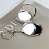 Easy To Clean Metal Keyring Cosmetic Mirror for Travel Office and Daily Activities Featuring Sturdy Construction
