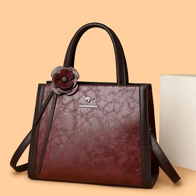 Elegancka torba shopper ze sztucznej skóry z ozdobą w kształcie kwiatu i regulowanym paskiem na ramię
