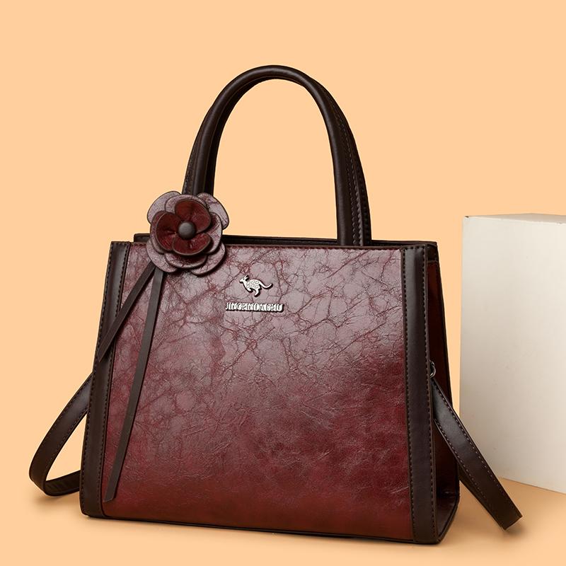 Elegant Faux Leather Tote Bag with Flower Decoration and Adjustable Shoulder Strap