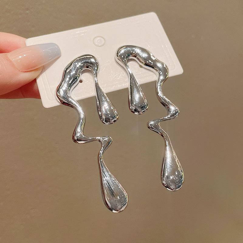 

Silver needle metal irregular water drop earrings personality exaggerated cold wind stud earrings niche design sense earrings women