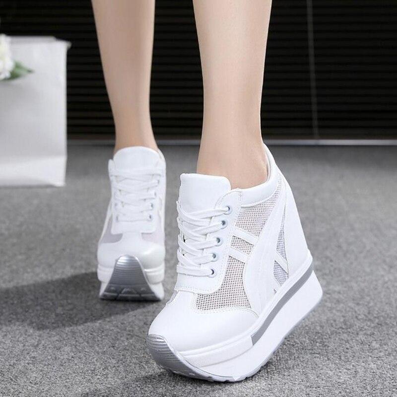 heeled trainers white