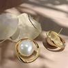 Twisted frame Baroque pearl earrings, irregular vortex metal, women's large imitation pearl earrings, elegant retro jewelry gifts