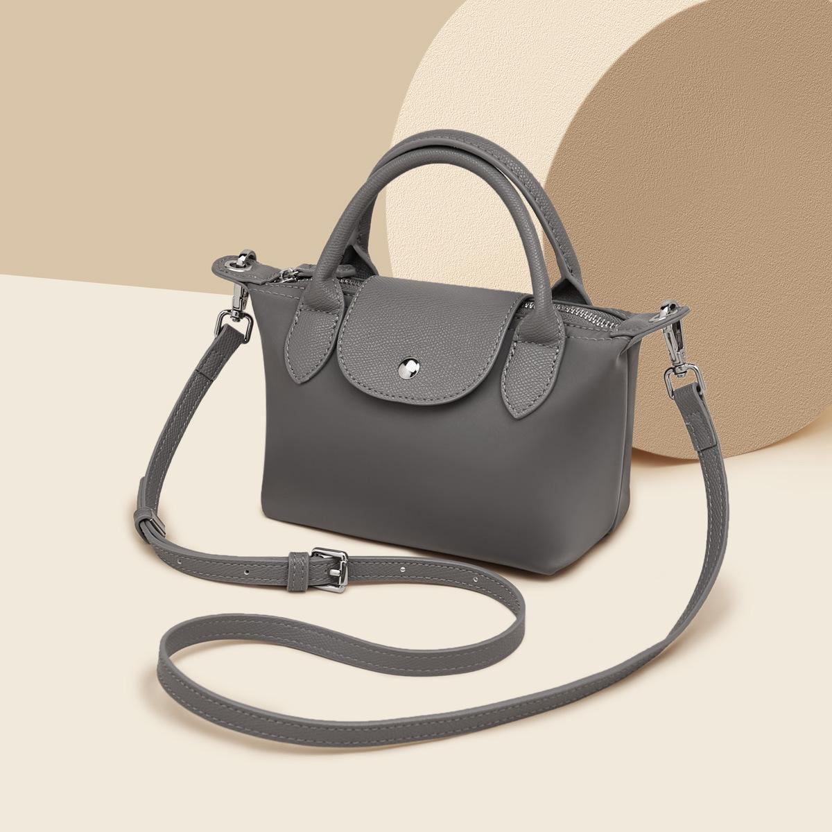 

Handheld Color Blocking Versatile Small Bag for Women, New Small Square Bag, High-end and Niche Crossbody Bag сірий колір