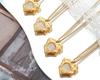Hong Kong-Style Elegant Heart-Shaped Cat's Eye Stone Pendant Necklace On Gold-Plated Clavicle Chain.