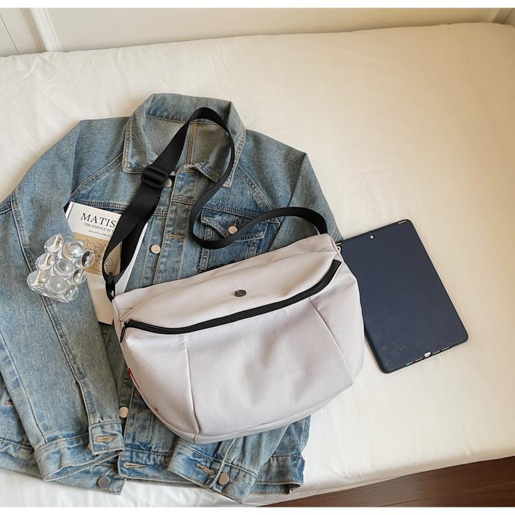 2025 summer new canvas dumpling bag niche design high sense fashion versatile going out commuter messenger bag