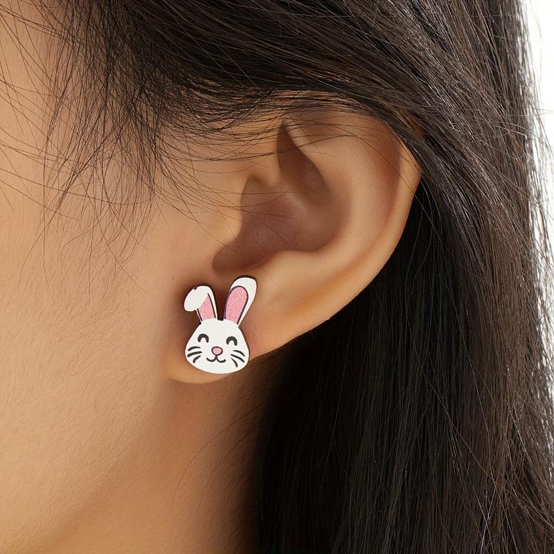 A pair of small and delicate wooden Easter bunny rainbow stud earrings, fashionable personality, literary and cute, high-end wood