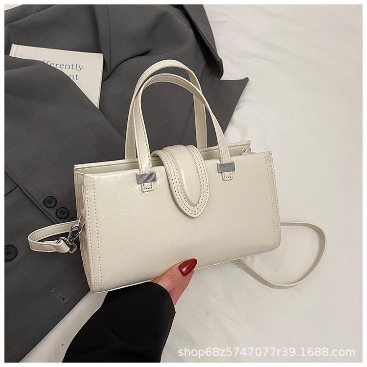 

Fashionable high-end temperament simple women s handbag oil wax leather solid color niche design crossbody bag білий