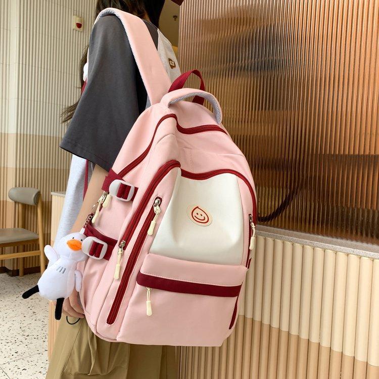 

Popular schoolbag Female junior high school student backpack Elementary school student High school student college student travel backpack Large c Single pack розовый