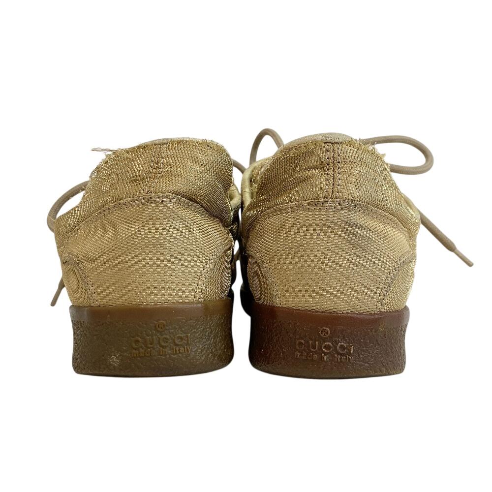 Gucci Niedrig geschnittene Leder-Sneaker goldfarbenes Leder Gebraucht