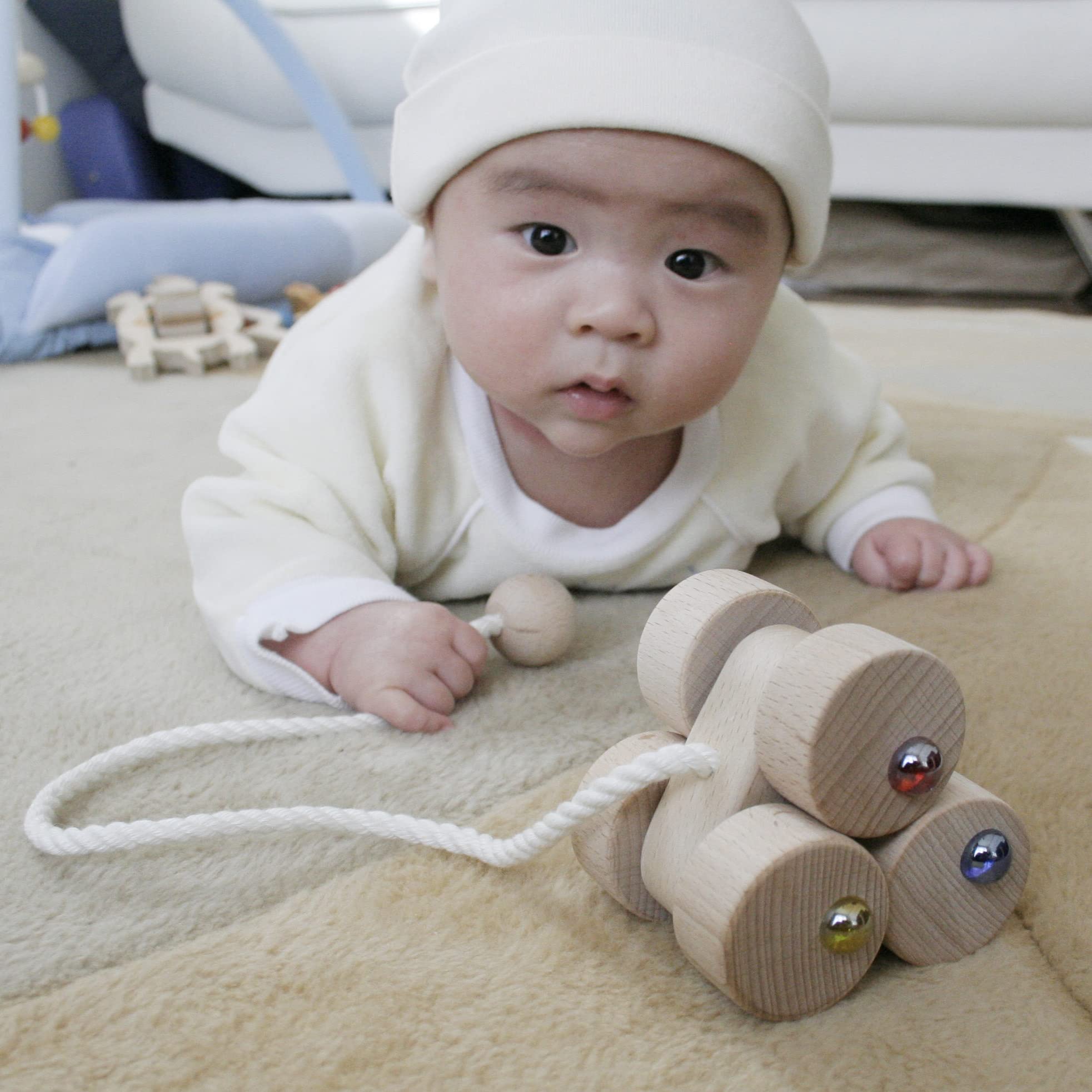 

Six-wheeled car (a wooden toy for crawling and walking) - Japan Good Toy Award winner. A great baby gift, educational toy, and car pull toy. Perfect