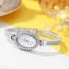 Full Diamant Personlighet Nisch Oval Liten Tallrik Dam Lätt Lyx Mode Vattentät Armbandsur Kvarts