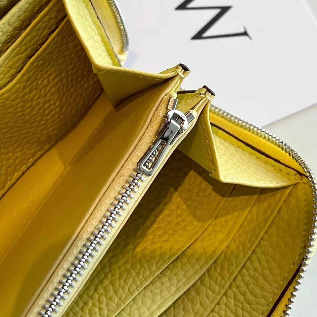 Nouveau petit sac à fermeture éclair en cuir de vachette première couche printemps 2026, portefeuille en cuir véritable, porte-monnaie en cuir souple, production et vente en gros par fabricant de Guangzhou