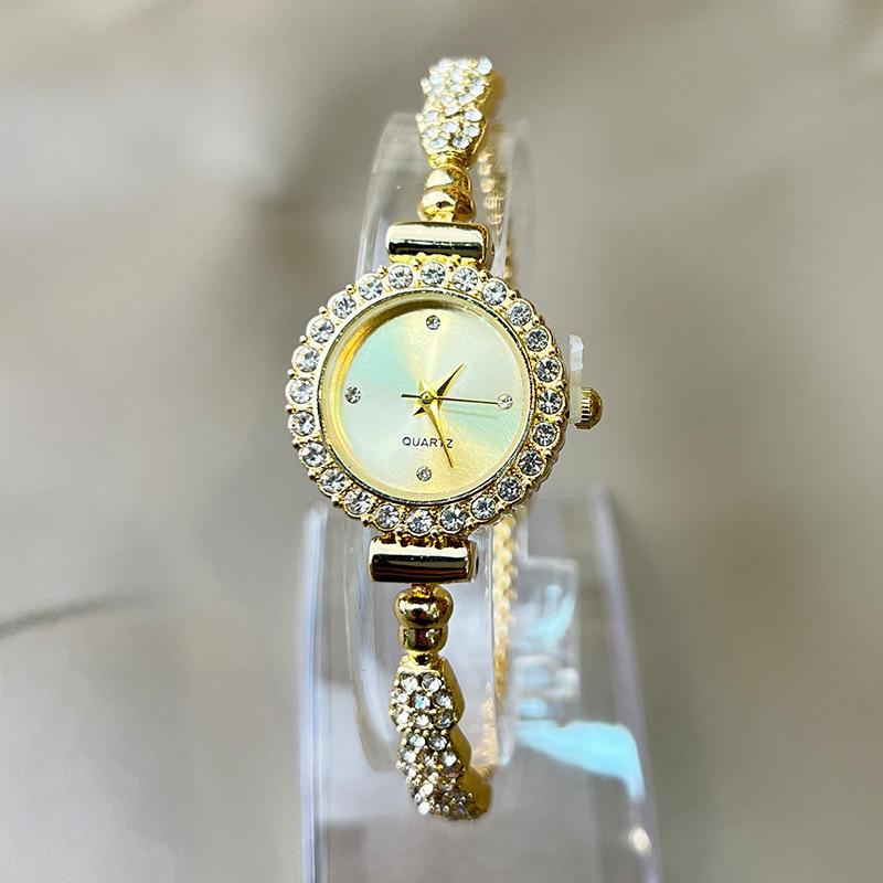 

Трендовые женские кварцевые часы-браслет с маленьким циферблатом 2024 золотой