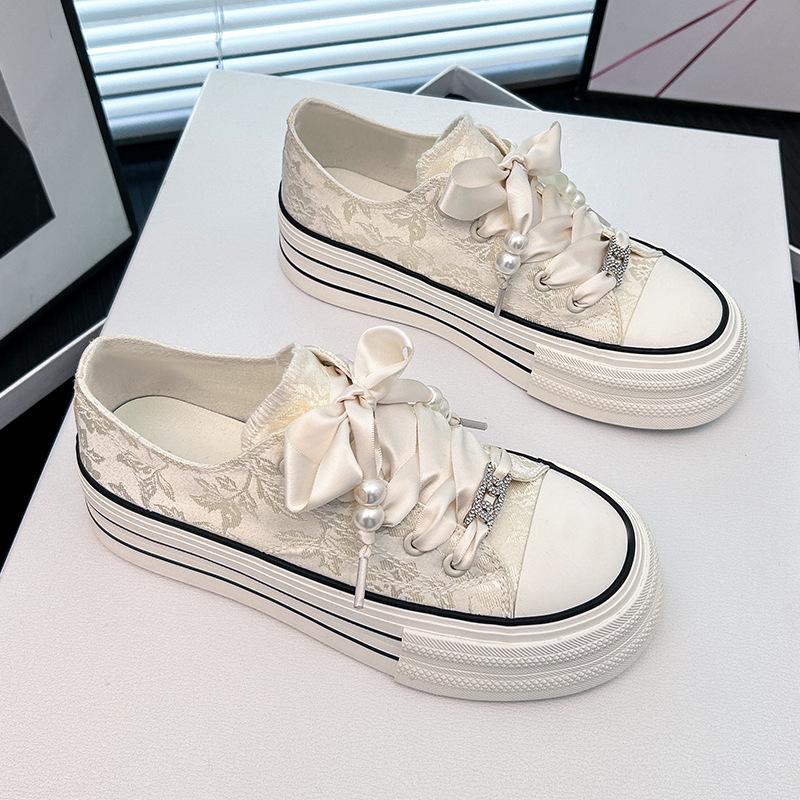 

Маленькие белые туфли на толстой подошве детские 2025 новые популярные весенне-летние маленькие люди показывают рост национальный стиль вышитые парусиновые туфли доска ш 40 бежевый