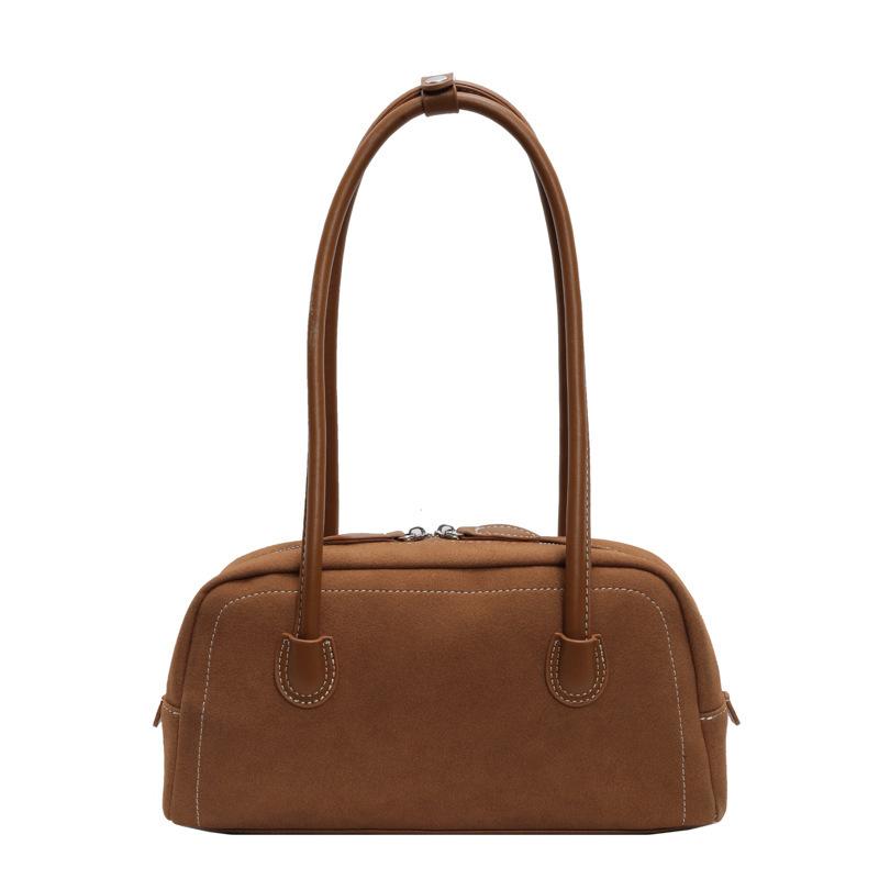 Vintage matte suede hand-held pillow bag women's 2026 new niche design underarm commuter shoulder bag