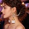 High-End Retro Bohemian Ethnic Style: Hollow Round Diamond-Encrusted Bell Long Earrings