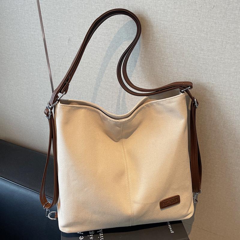 Sac femme nouveau grande capacité sac à dos de trajet sac bandoulière sac décontracté multi-port pour sortir