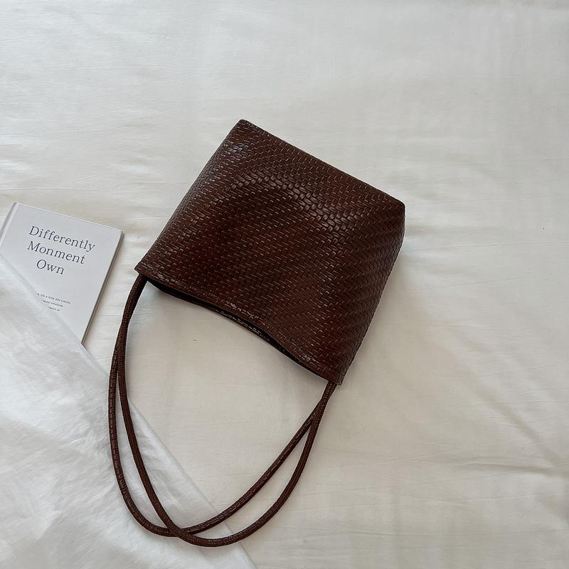 Damen gewebte PU-Eimertasche Minimalistische Umhänge-Handtasche für den täglichen lässigen Einkauf