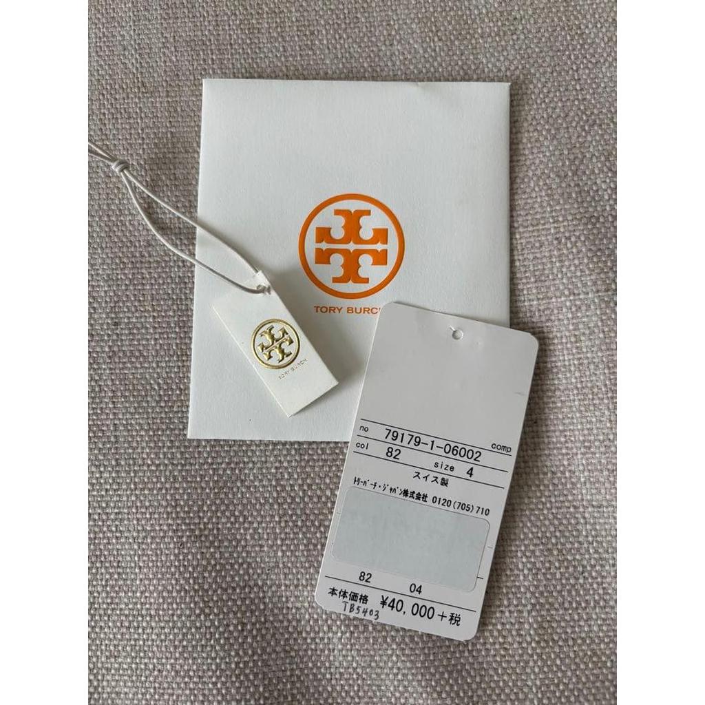 Used Tory Burch watch gold orange