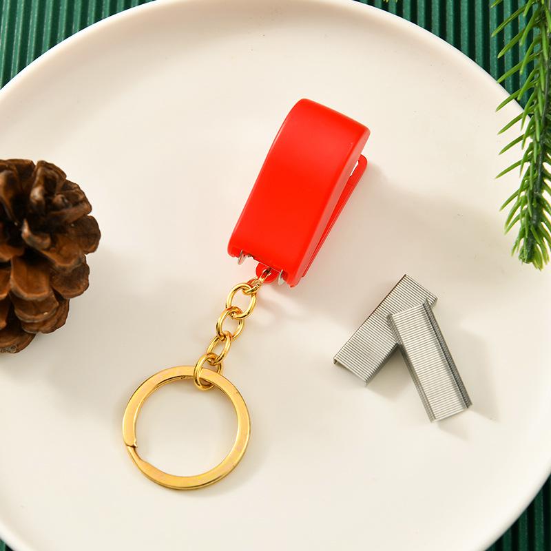 Vánoční kreslená mini sešívačka s klíčenkou - Roztomilý studentský dárek