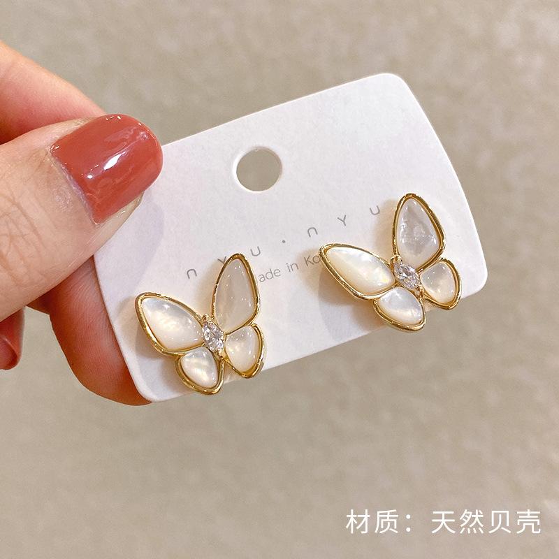 Shell butterfly stud earrings New trendy high-end earrings Women s summer Korean temperament Dongdaemun earrings