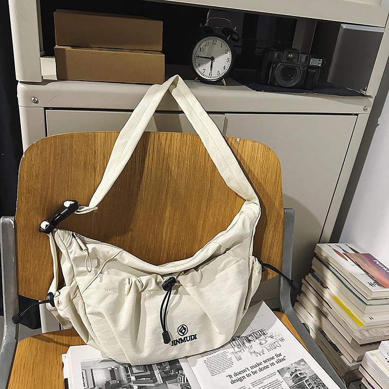 Summer new foreign style texture simple large capacity dumpling bag 2025 fashion trend women's shoulder messenger bag
