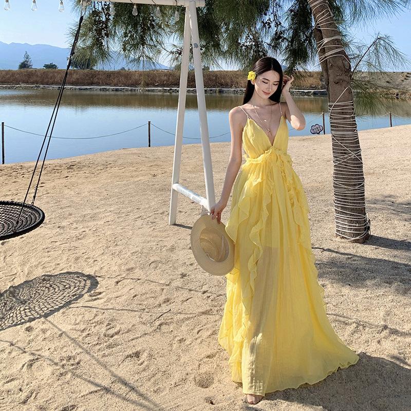 Seaside vacation dress women s summer new socialite temperament suspender backless yellow skirt S жёлтый