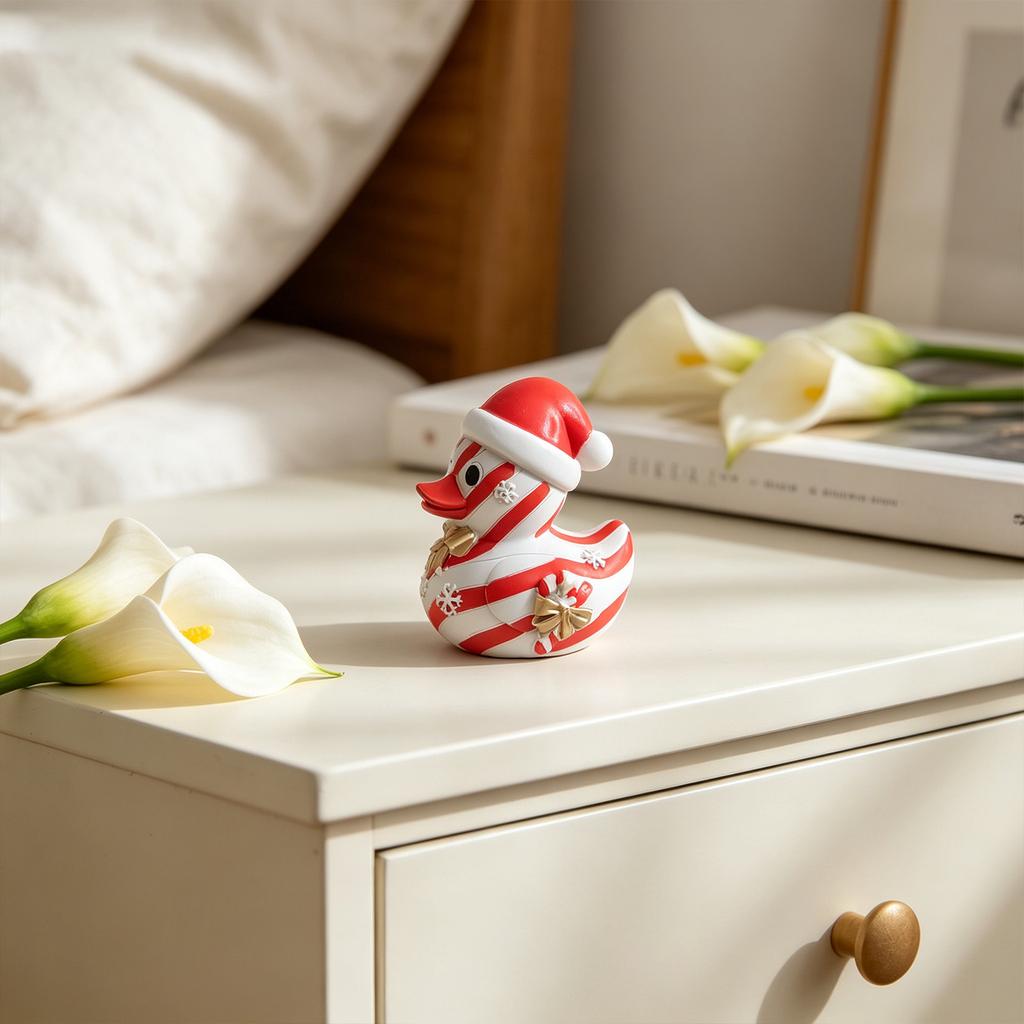 Resin Candy Stripe Duck Figurine Holiday Tabletop Decoration with Bow and Snowflake Details Festive Seasonal Ornament for Home and Office Display