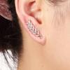 European Fashion Silver Needle Leaf Stud Earrings with Symmetrical Hollow Design and Modern Elegance