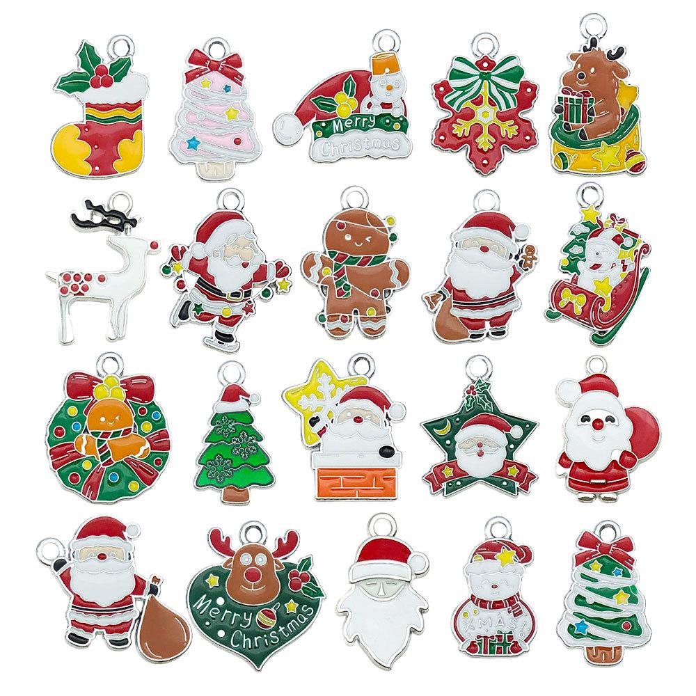 100-teiliges Weihnachts-Tropföl-Legierungs-Schmuckzubehör: Weihnachtsmann, Schneemann, Glocke, Rentier Anhänger für DIY Armbänder.