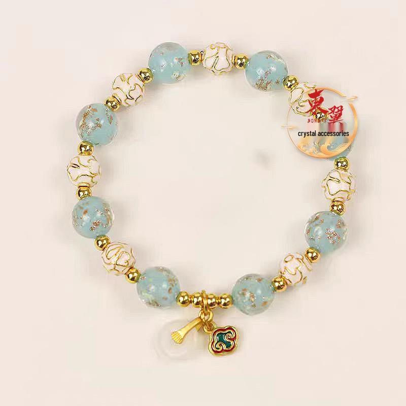 Blue Luminous Cloisonné Gold Sand Glass Bracelet with Prosperous Flower Beads and Ash Porcelain Gold Foil.