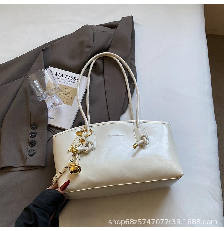 Large-capacity bag women's spring and summer versatile 2025 new simple shoulder armpit bag casual commuting tote bag