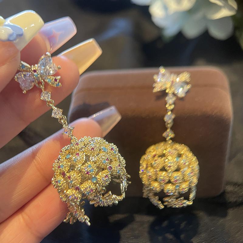 

Серьги-шарики Carousel Bow с объемным сердечком Love Zircon Color Gold Plated Light Luxury Ear Jewelry