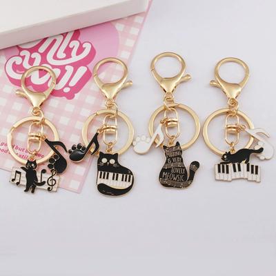 1PC Cat Keychain Handbag Charm Musical Piano Creative Car Key Chains for Women Keyring Alloy Guitar Music Note Pendant