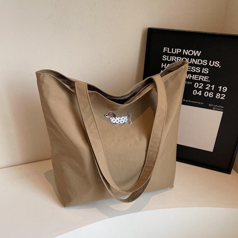 

2025 new large-capacity class commuter bag women s fashion Korean tote bag casual one-shoulder student canvas bag хакі