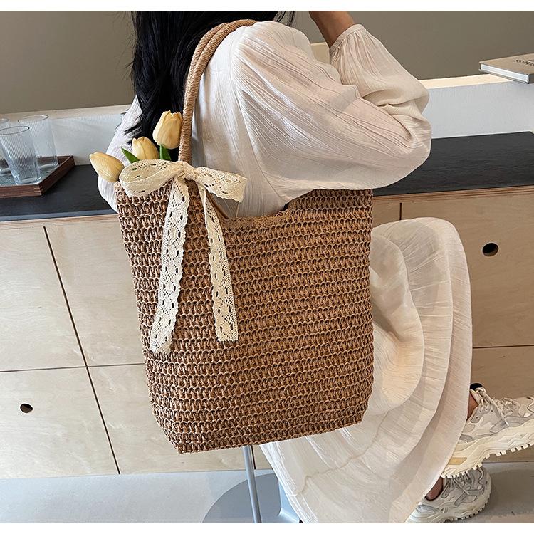 Seaside beach bag women's spring new fashionable large-capacity shoulder bucket bag casual woven bag