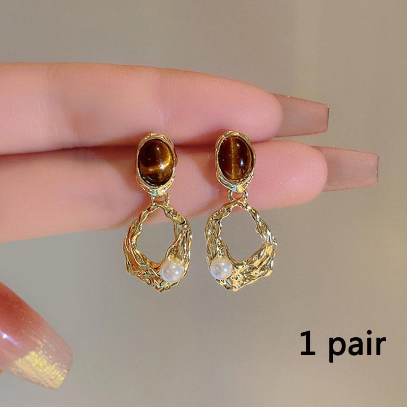 

Женские серьги Murad Wind Tiger Eye Stone Earrings Женский нишевый дизайн Senior Sense Of Irregular Oval Hollowing Hundred With Earrings 1 Pair
