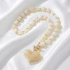 European and American retro amber ins big love pendant necklace, simple and exaggerated Maillard smudged round bead necklace