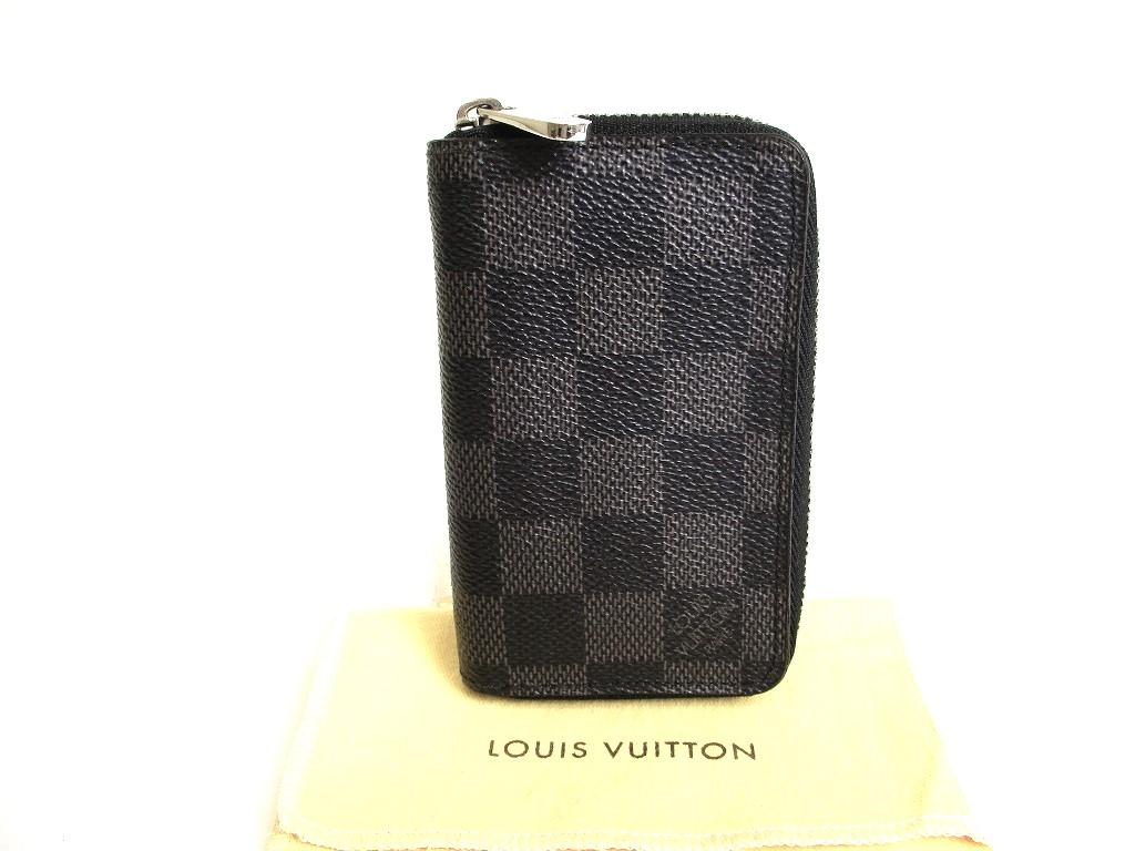 

Автентичний гаманець для монет LOUIS VUITTON Damier із графітової шкіри Zippey #9861 Відремонтований
