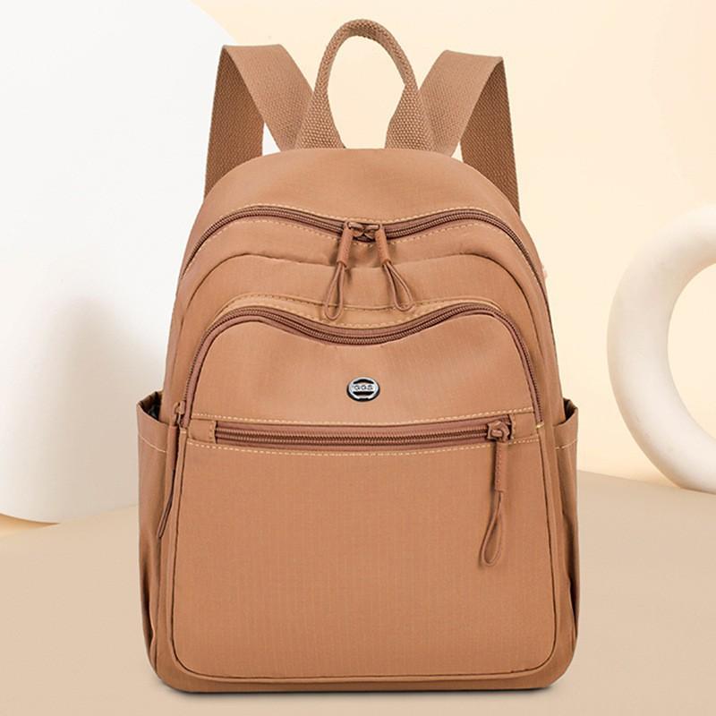 

Модная женская сумка 2025 года Новый однотонный рюкзак Повседневный универсальный Нейлоновая ткань Большая вместимость Для путешествий