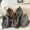 Leopard Print Backpack Casual Daily Use Trendy Street Style Lightweight Backpack for Women with Tassel Detail for School Travel and Everyday Outings