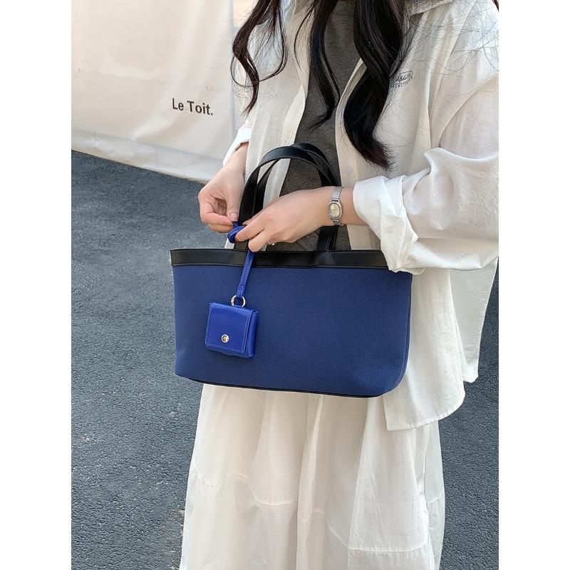 

Handbag women s large-capacity tote bag women s niche splicing design new canvas bag commute to work синий