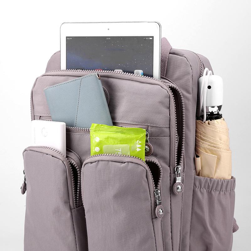 A Stylish And Simple Lightweight Nylon Leisure Backpack With Multi-pocket Backpacks For Men And Women Is Suitable For Schools